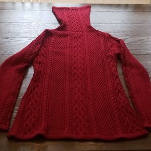 Red funnel neck cable knit sweater